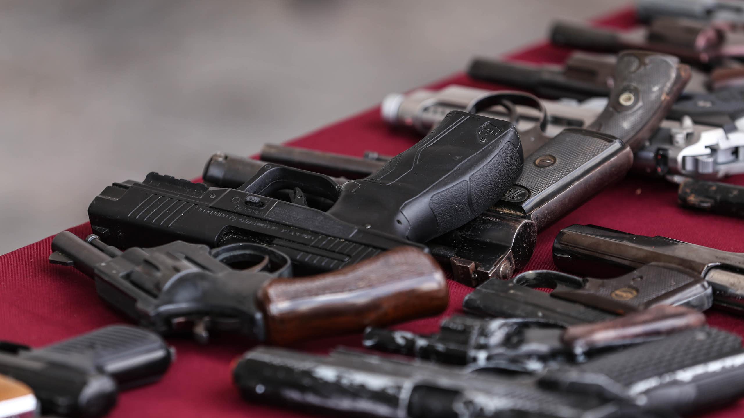 Guns on a table in Mexico.