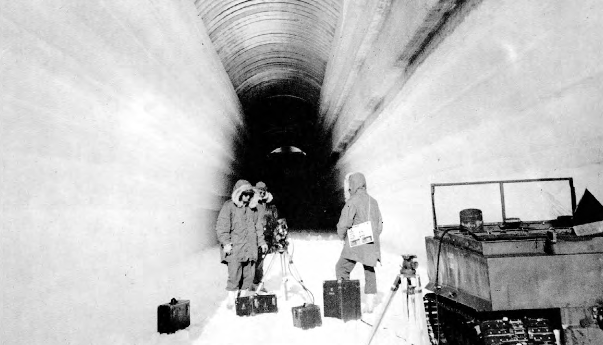US soldiers digging tunnels in the snow in Greenland in the 1960s.