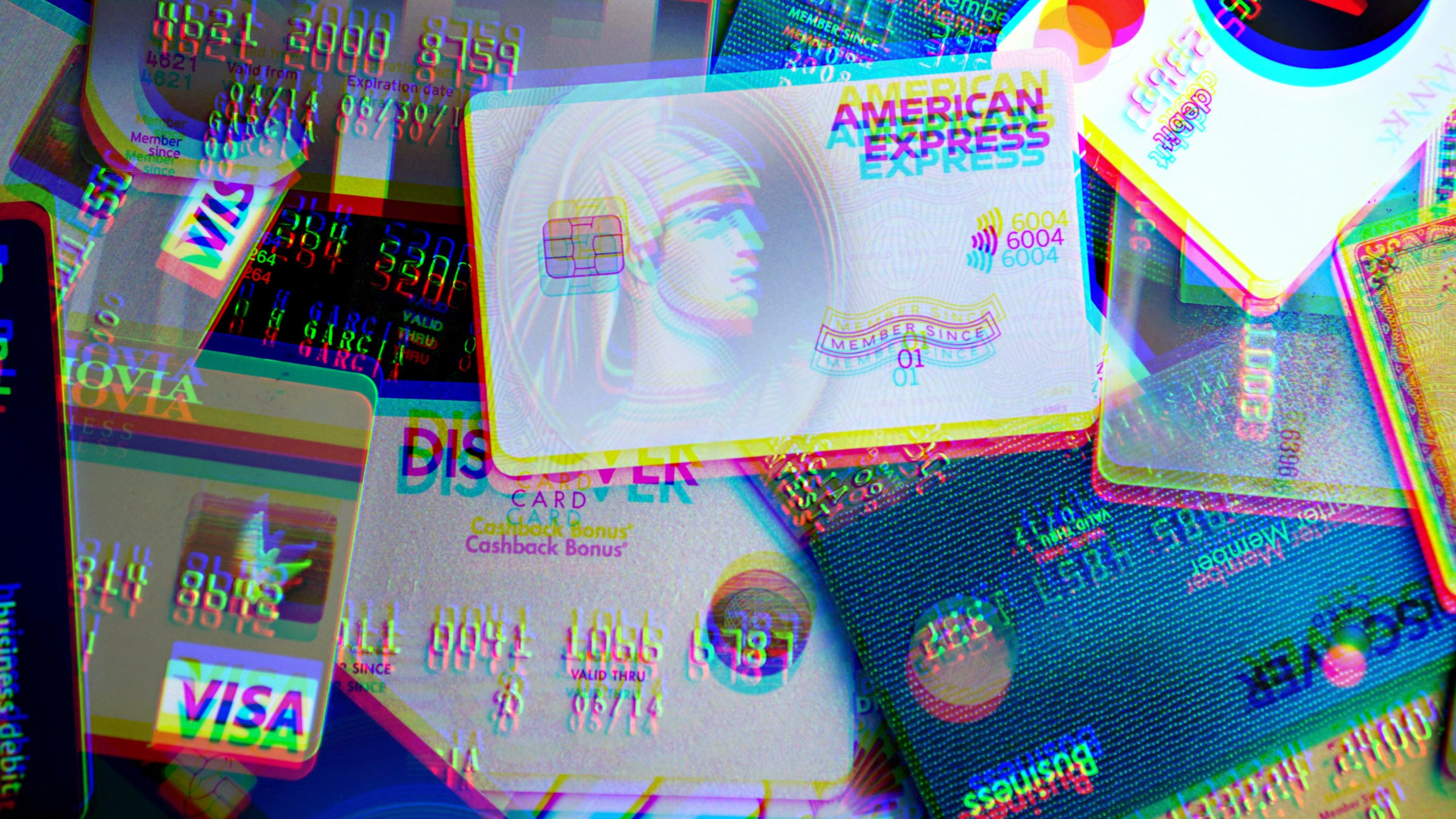 A collection of bank cards with glitch effect. 